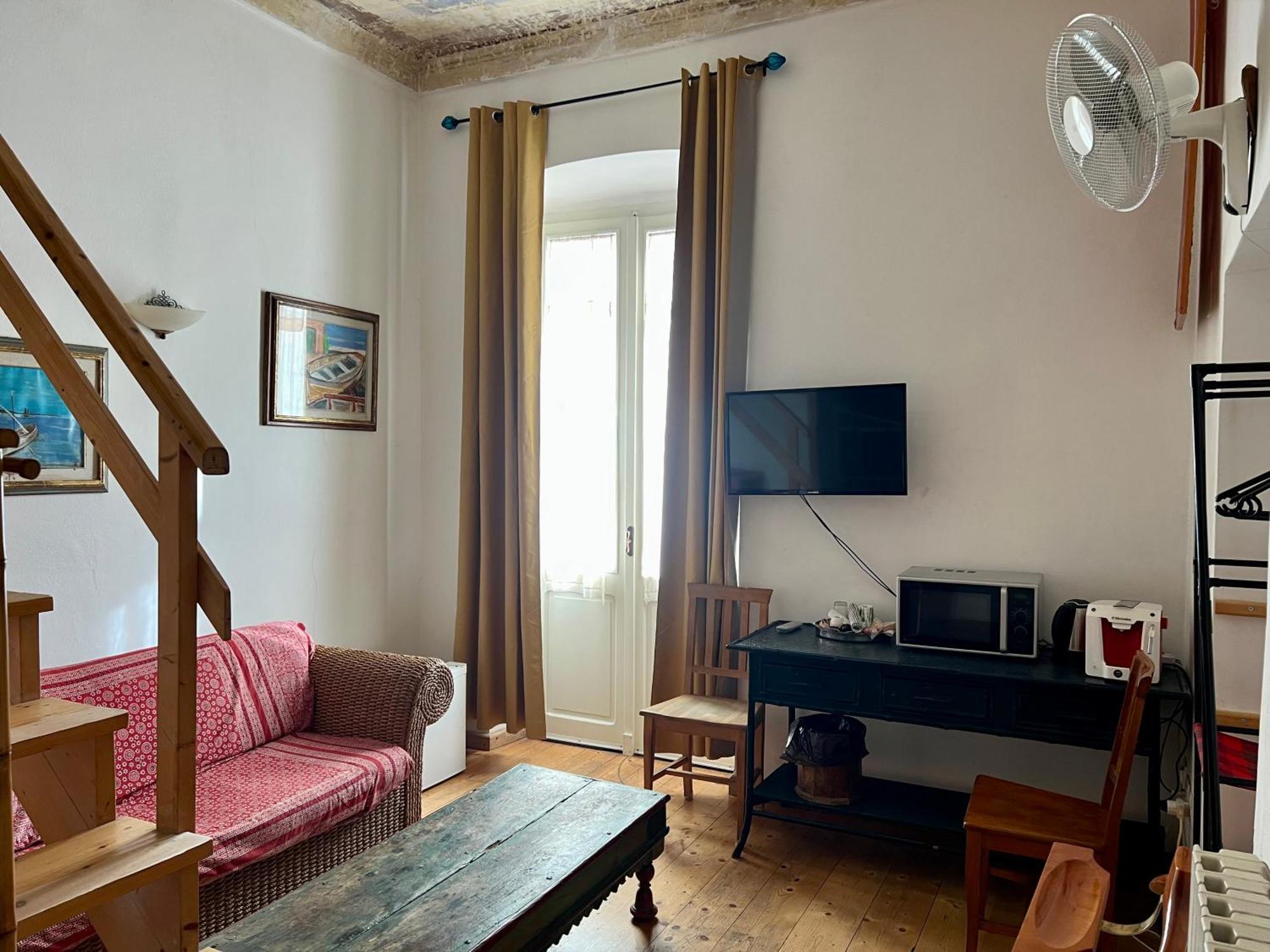 B&B Le Finestre Su Via Cavour 萨萨里 客房 照片